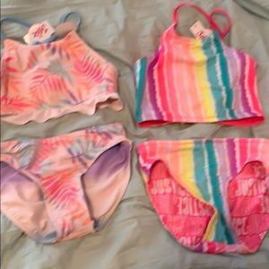 Girls justice swim suit. Reversible. NWT